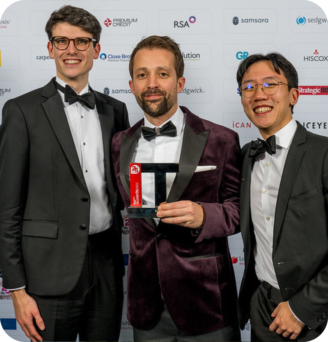 Alexis, Matt and Andy winning an award